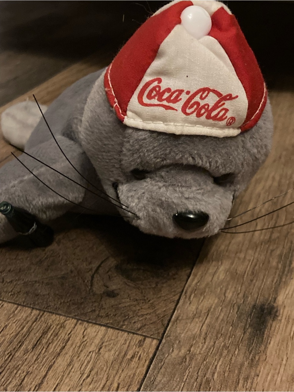 Coca-Cola Gray Seal Plush with Red and White Cap